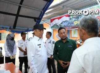 Pj Bupati Inhil Salurkan Bantuan dari PT. SRL