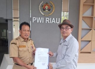 Pj Gubri Dukung Provinsi Riau Tuan Rumah HPN 2025