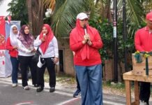 Camat Senapelan, Rein Rizka Karvy, S.STP., M.Si berkenan memberikan sambutan