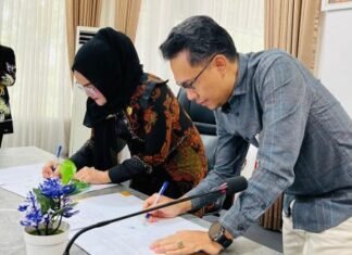 Bapenda Pelalawan Gandeng BRK Syariah Digitalisasi Retribusi Kebersihan