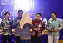 BRK Syariah Raih Penghargaan Kemitraan Ekosistem Keuangan Kampus di Milad ke-64 UNRI